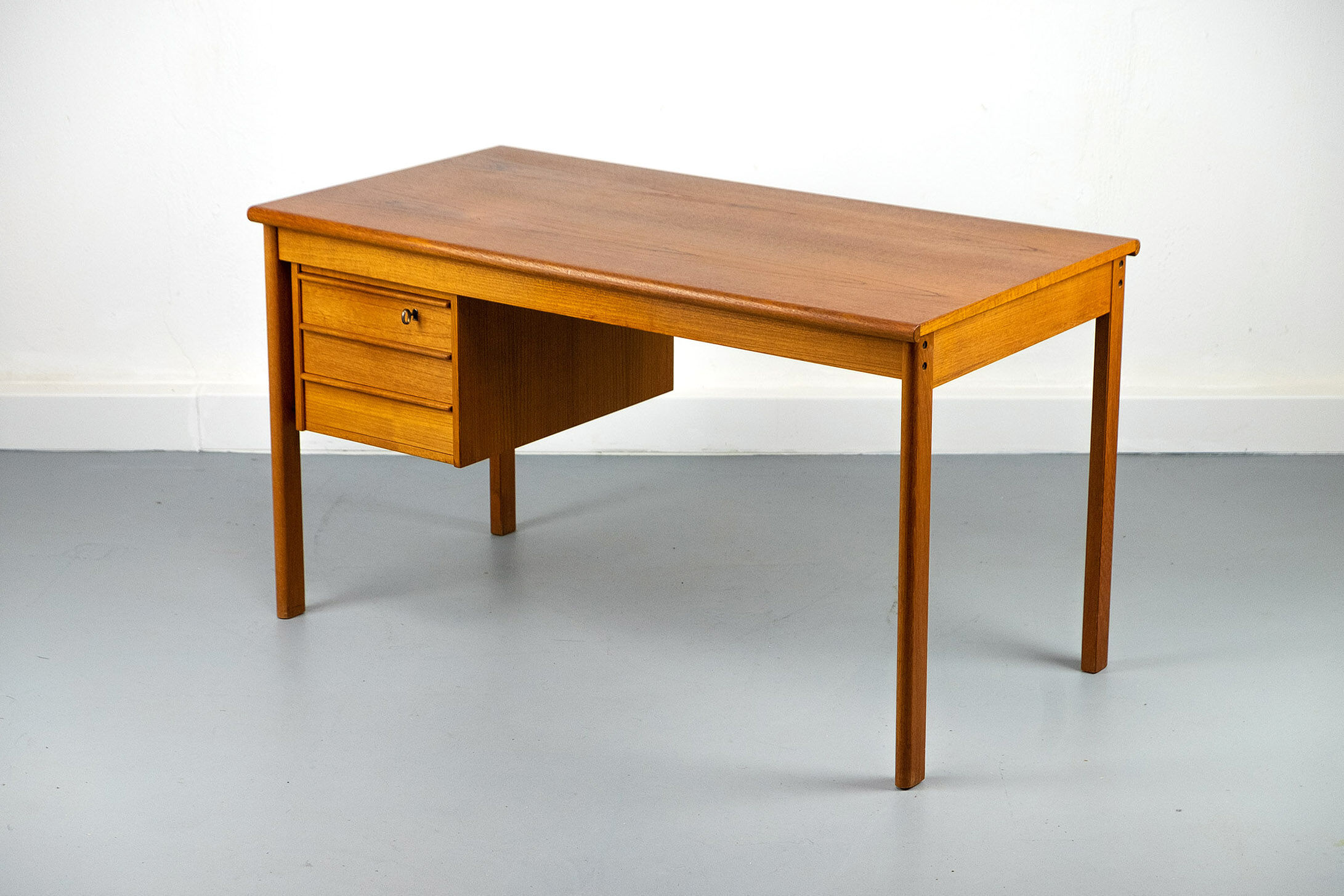 Teak Desk with movable table top by Løvig, 1960s