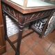Antique display cabinet in 19th-century Gothic Revival style.