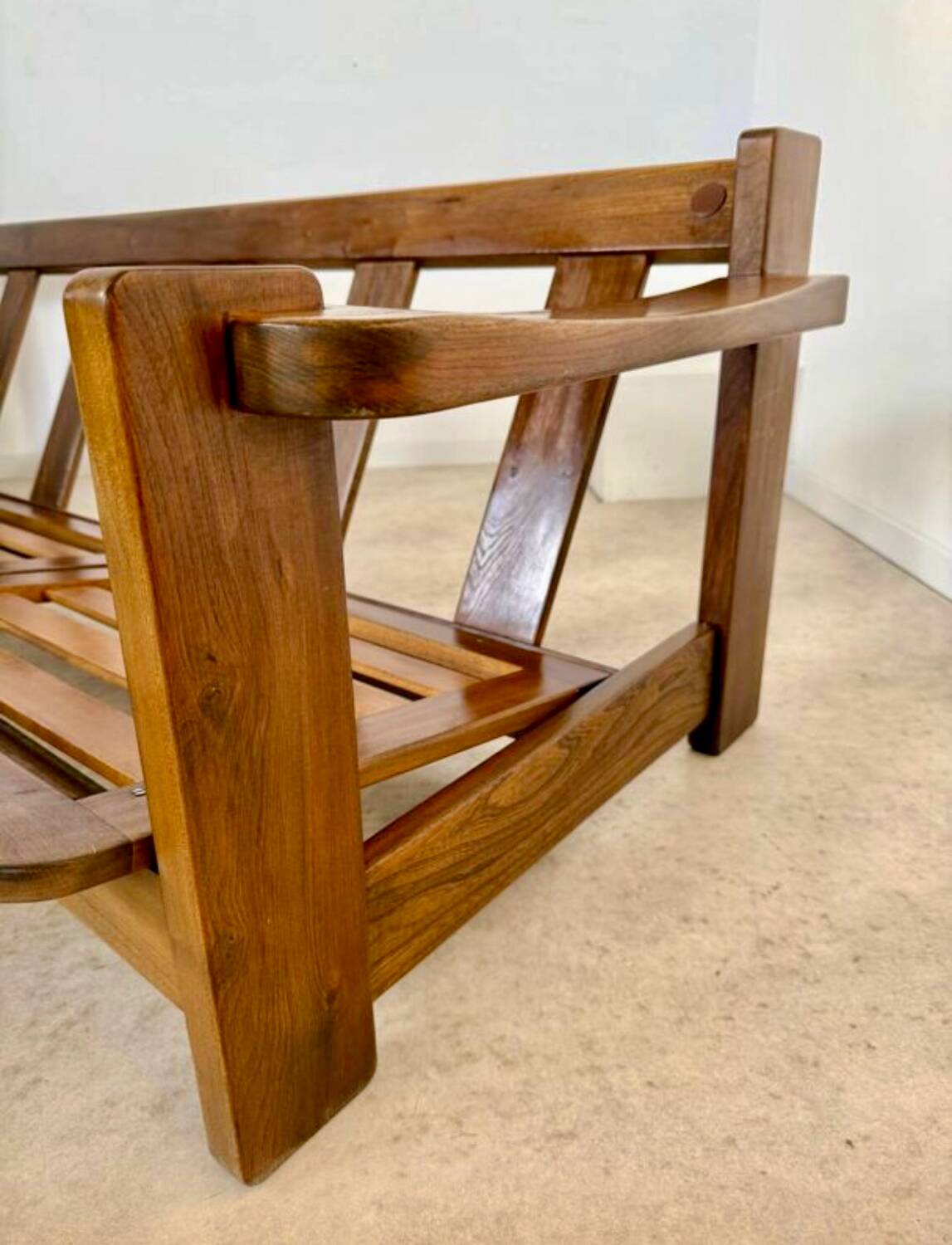 Old 3-seater sofa in solid wood, Maison Regain design, from the 70s.