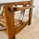 Old 3-seater sofa in solid wood, Maison Regain design, from the 70s.