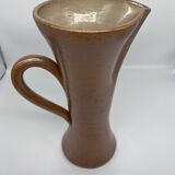 Pitcher in sandstone
