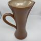 Pitcher in sandstone