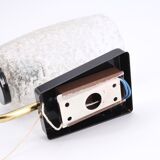 Pair of gold and black metal sconces, 50s