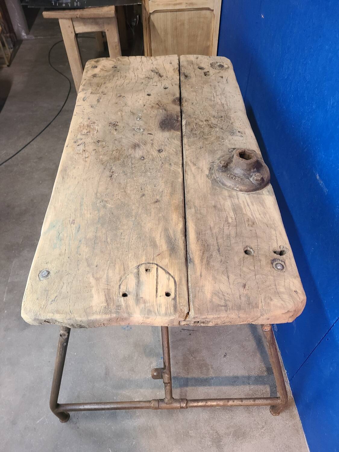 Vintage workbench circa 1930, folding metal leg.