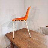 Chair with openwork plastic shell 1970