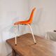 Chair with openwork plastic shell 1970