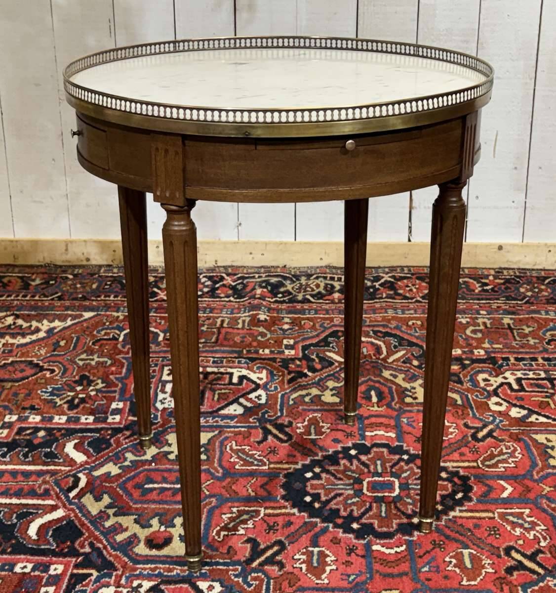 Louis XVI style bouillotte table from the 1960s in mahogany with a marble top.