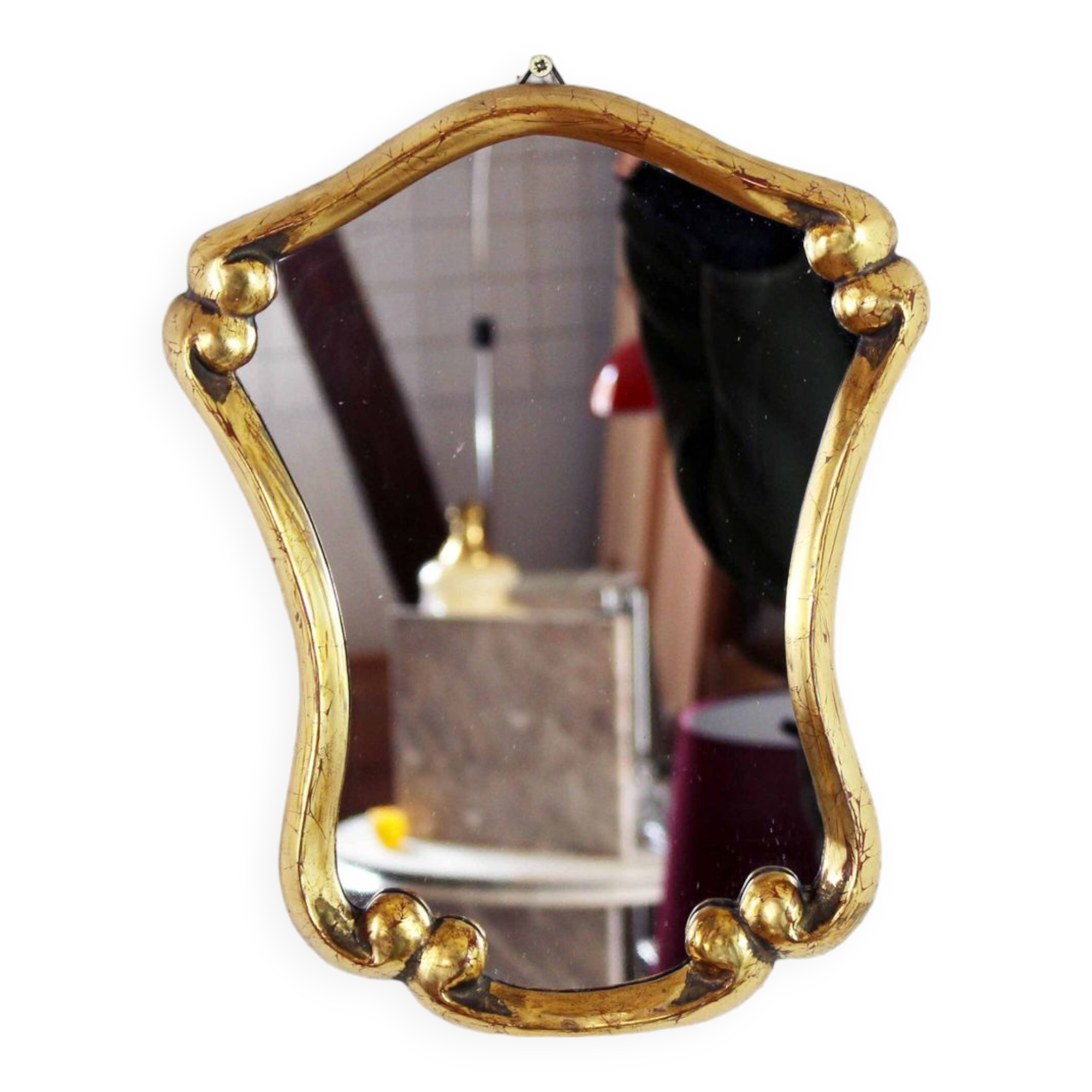 Mirror in gilded wood with leaf