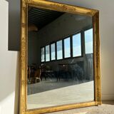 Golden mirror style Restoration decorated with stretched palmettes