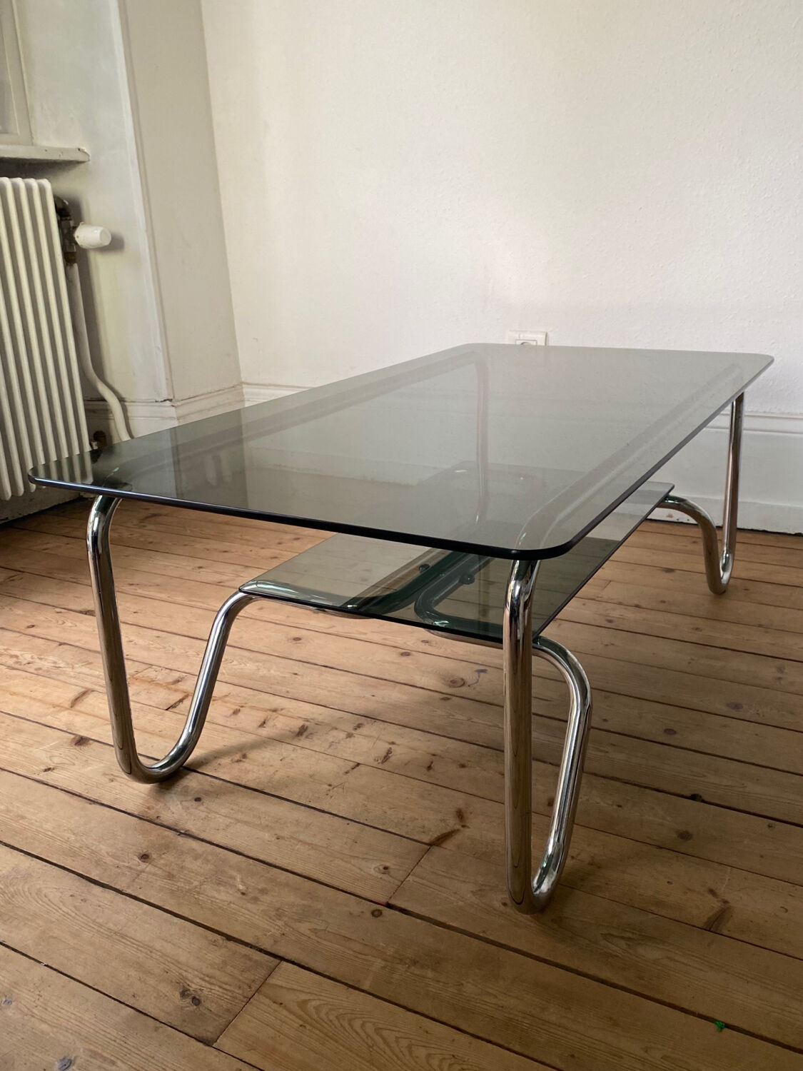 Tubular frame smoked glass coffee table 1970 vintage