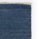 Scandinavian style minimalist flat weave rug. A small one.
