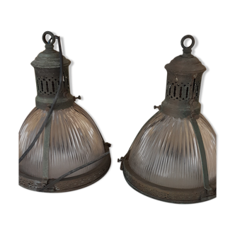2 holophanous industrial lamps