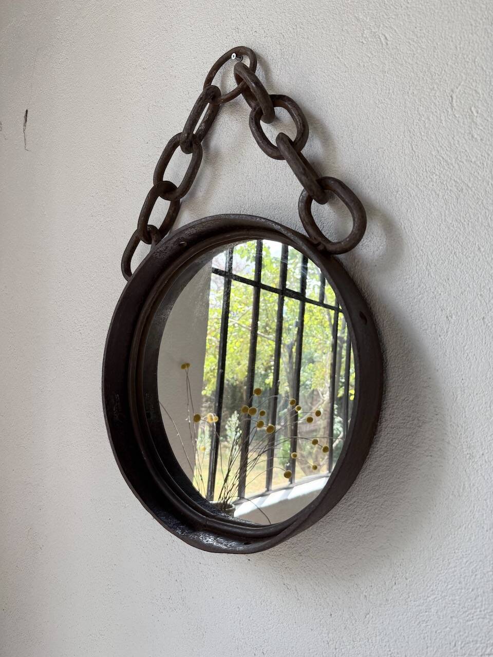 Brutalist mirror with metal chain from the 50s