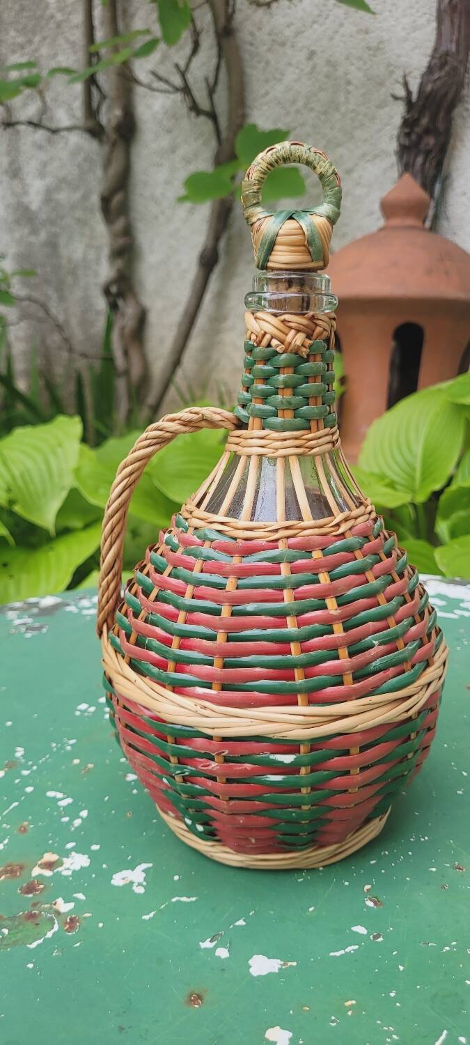 Glass and rattan carafe