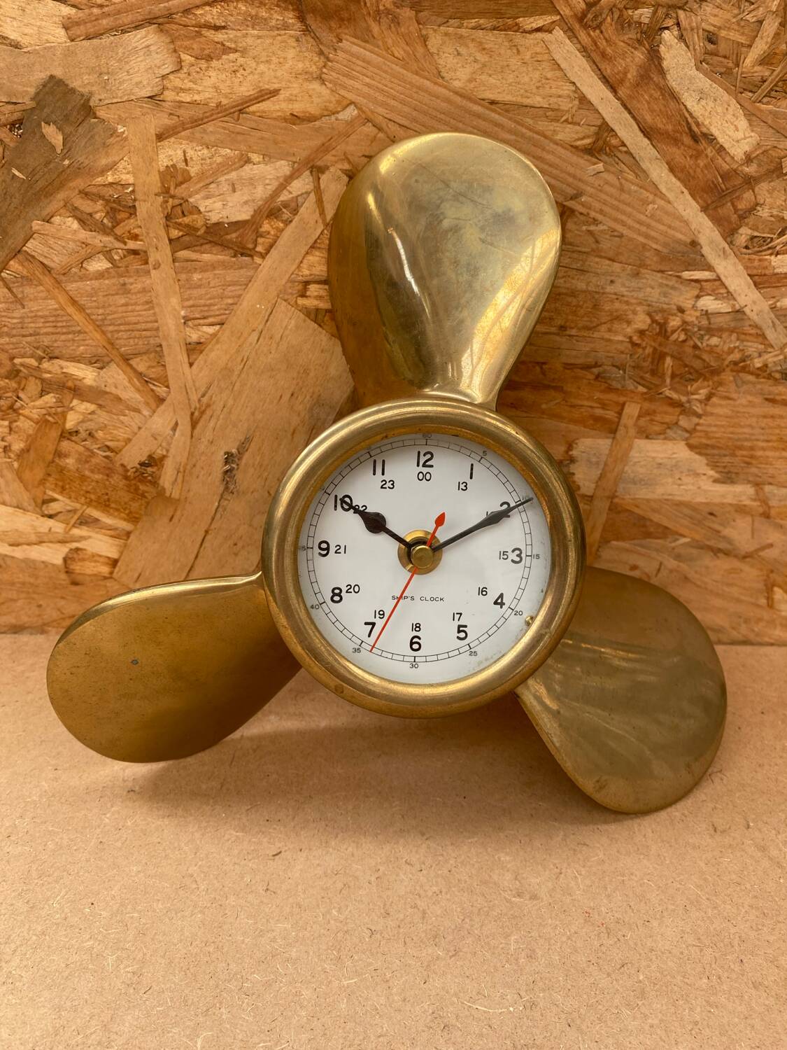 Antique brass propeller with pendulum vintage nautical wall clock