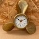 Antique brass propeller with pendulum vintage nautical wall clock
