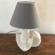 Carved stone lamp