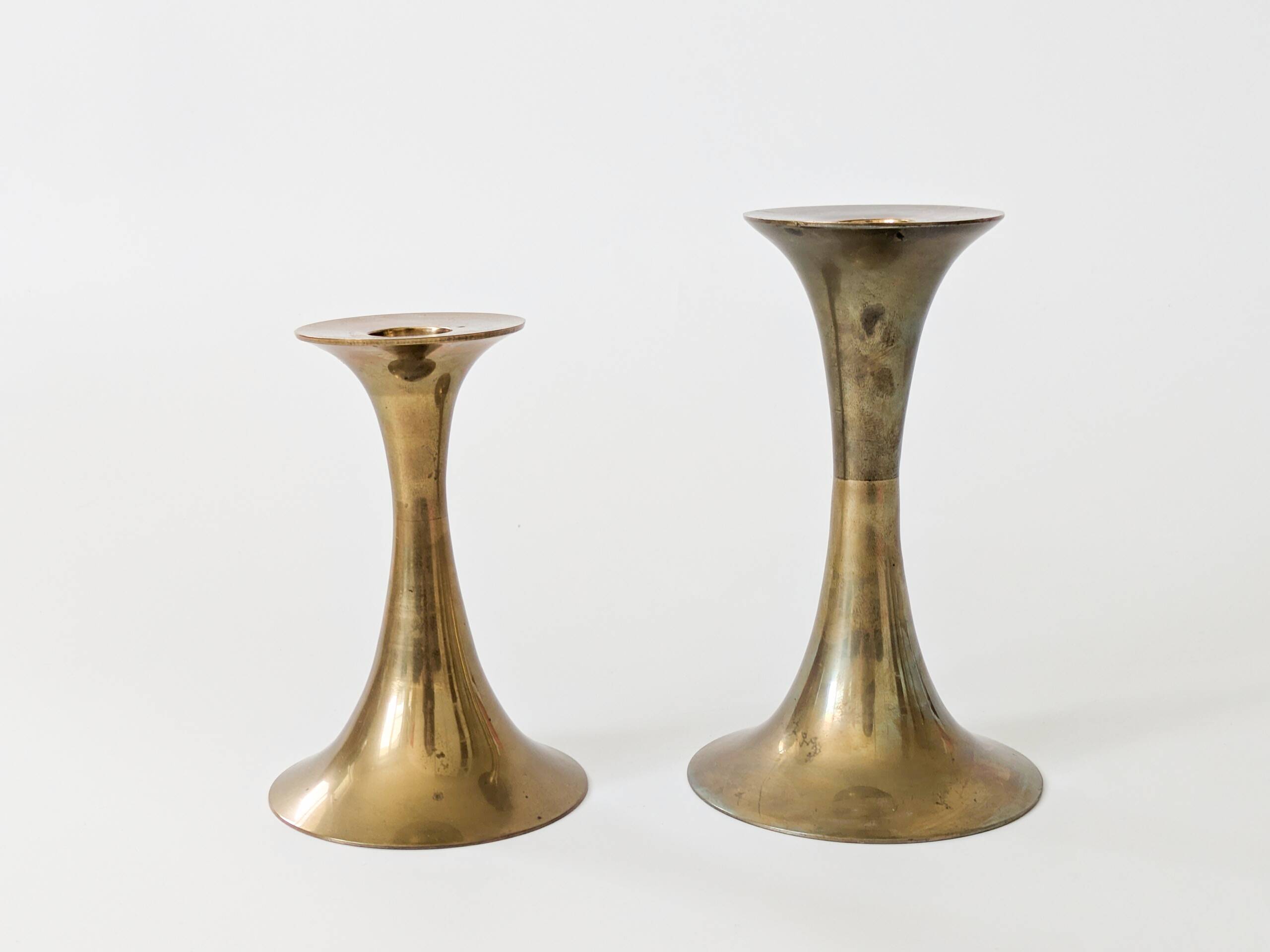 Pair of Midcentury brass candlesticks, flared shape.