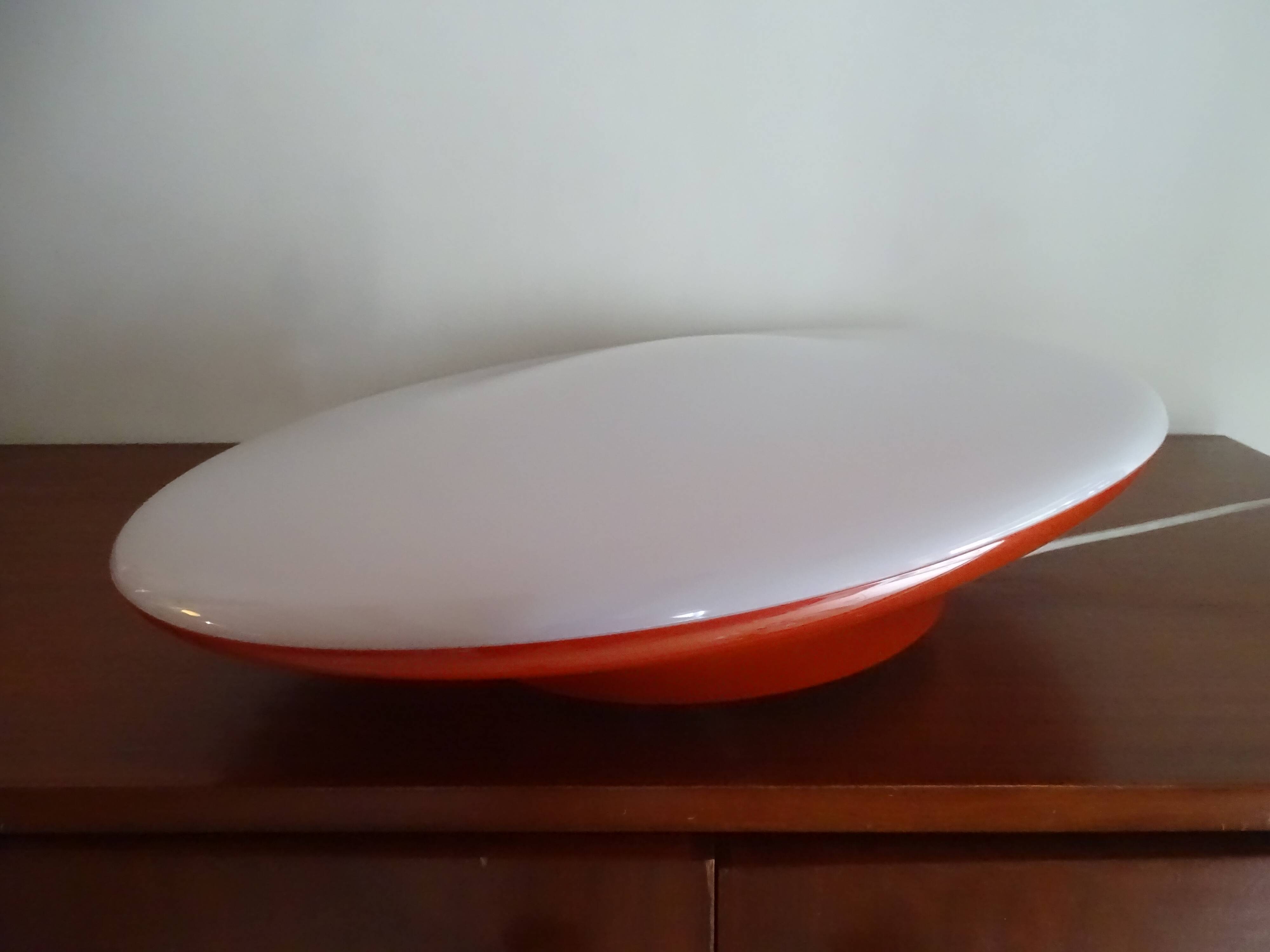 Oval wall lamp design ARTEMIDE 1980 by Patrick Jouin orange/white