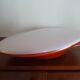 Oval wall lamp design ARTEMIDE 1980 by Patrick Jouin orange/white