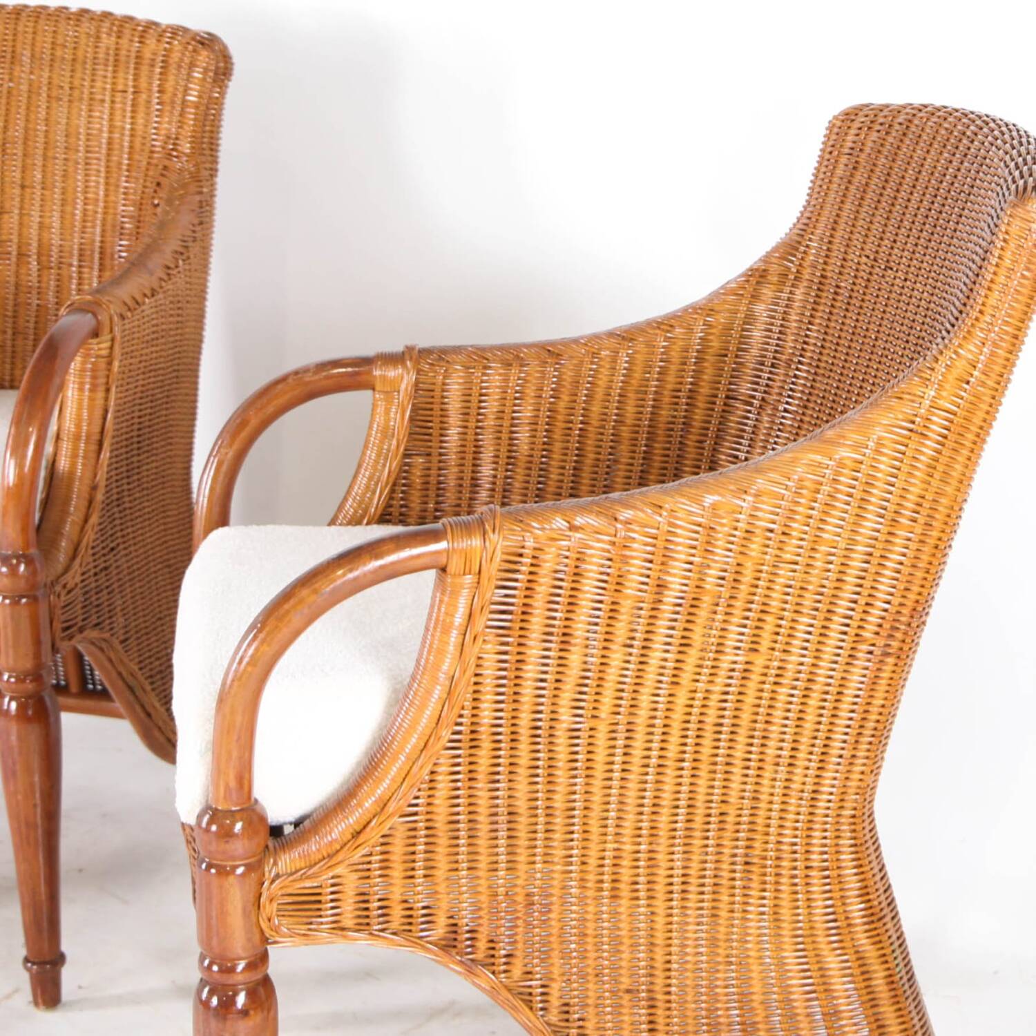 Pair of wooden and wicker armchairs