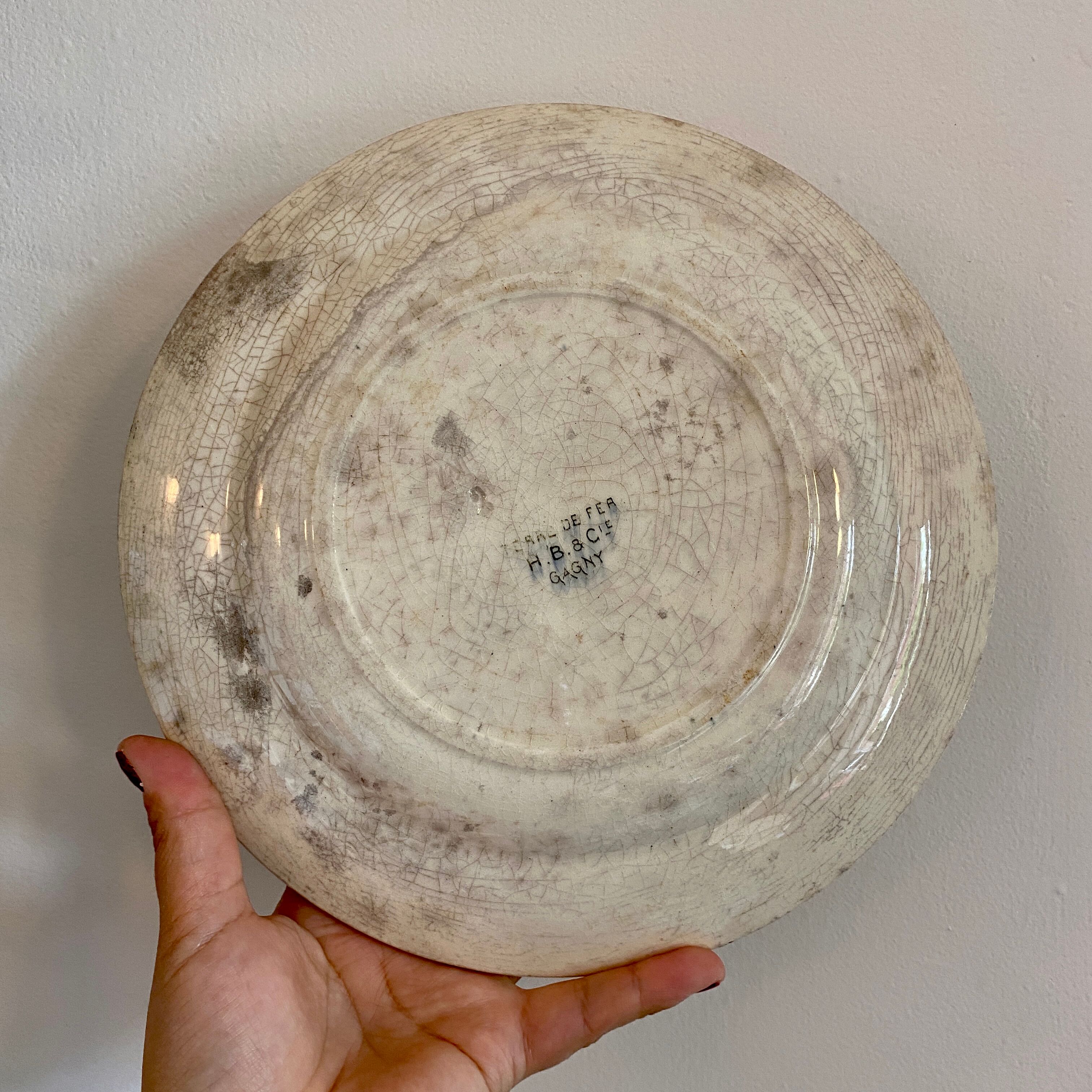 Set of 6 mismatched old iron earth flat plates