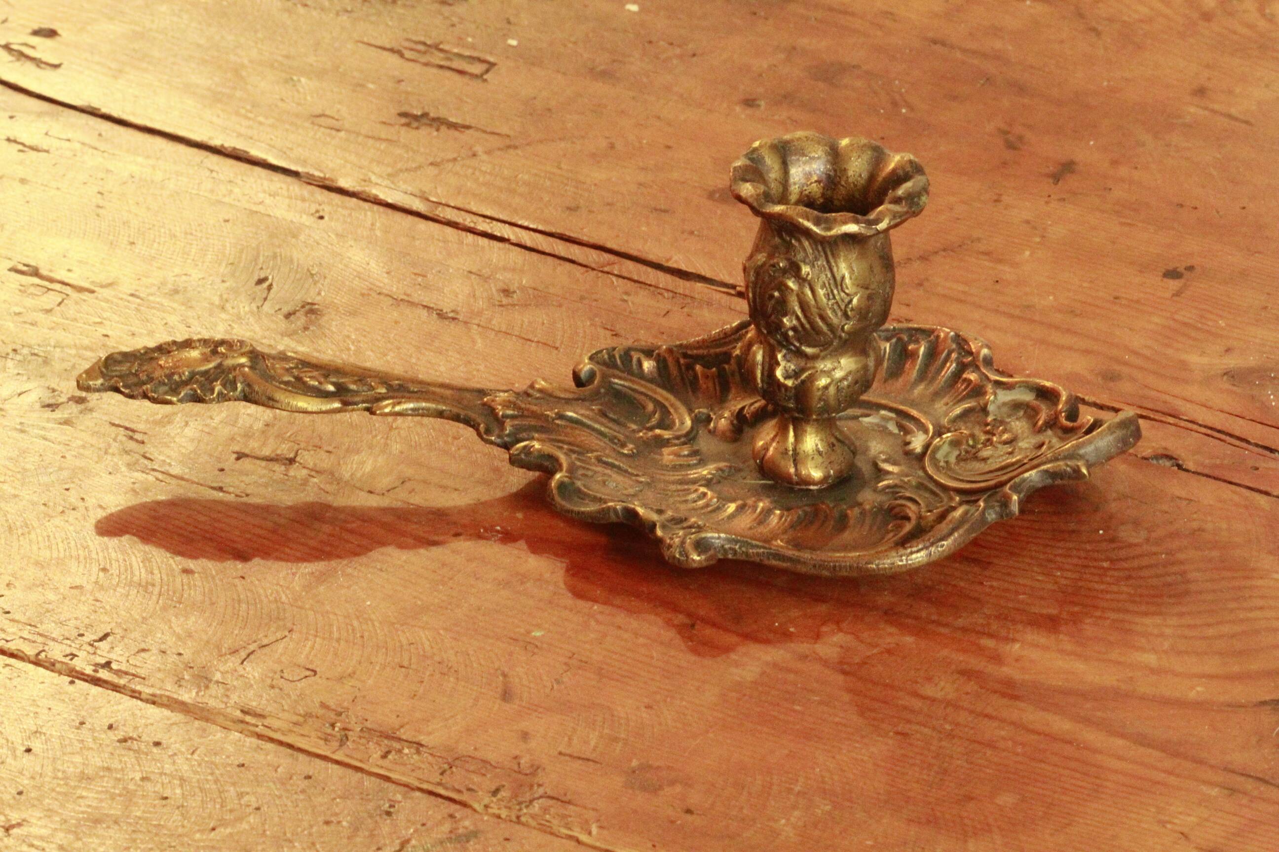 Old hand candle holder
