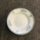 8 earthenware plates in St Amand earthenware with plant motif