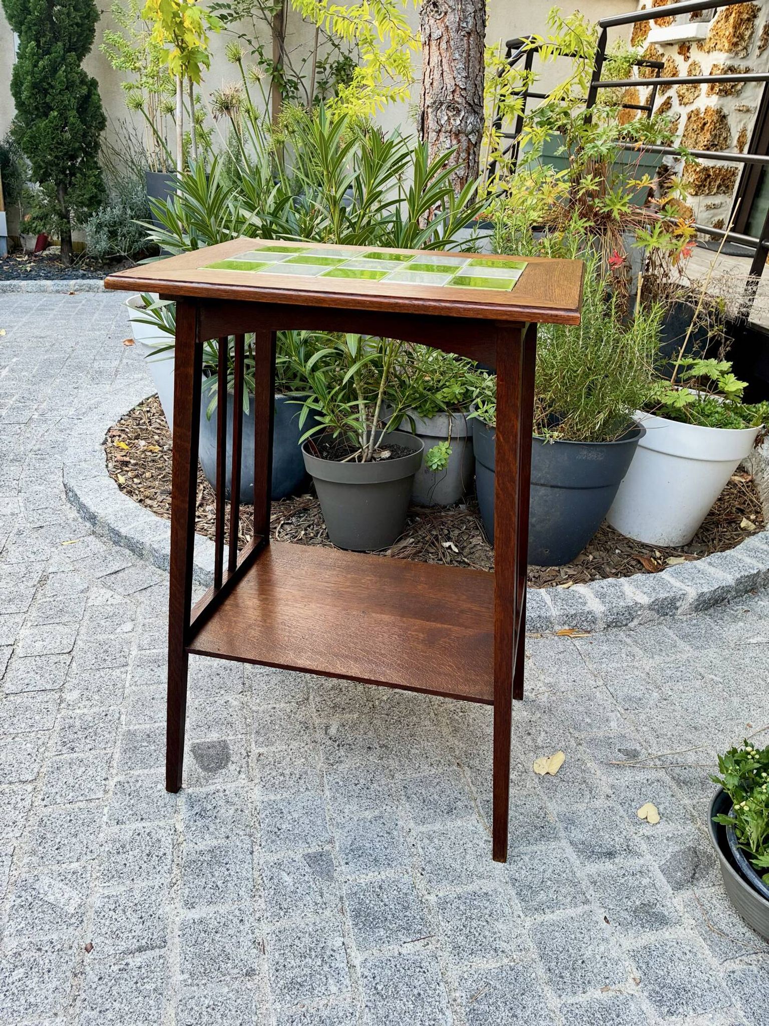Art Nouveau side table 1910 with double tops in dark oak.