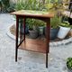 Art Nouveau side table 1910 with double tops in dark oak.