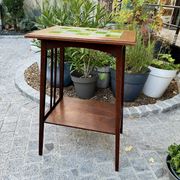 Art Nouveau side table 1910 with double tops in dark oak.