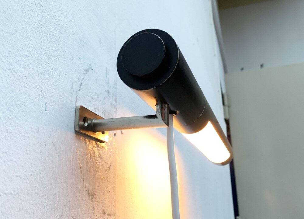 Mid-century minimalist wall lamp by Egon Eiermann for Beisl, 1960s.