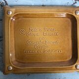 Under the plate of vintage advertising Little Butter Lu