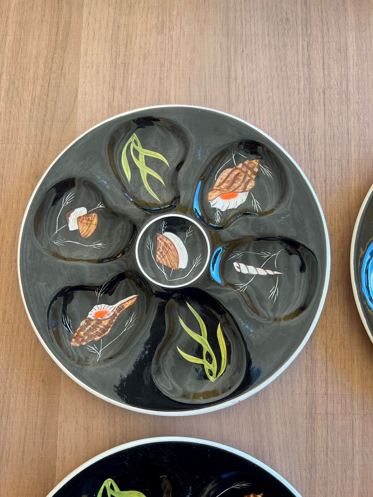 4 Henriot oyster plates