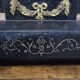 Large notary clock in black marble and gilded bronze.