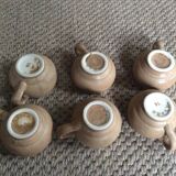 Series of 6 sandstone cups