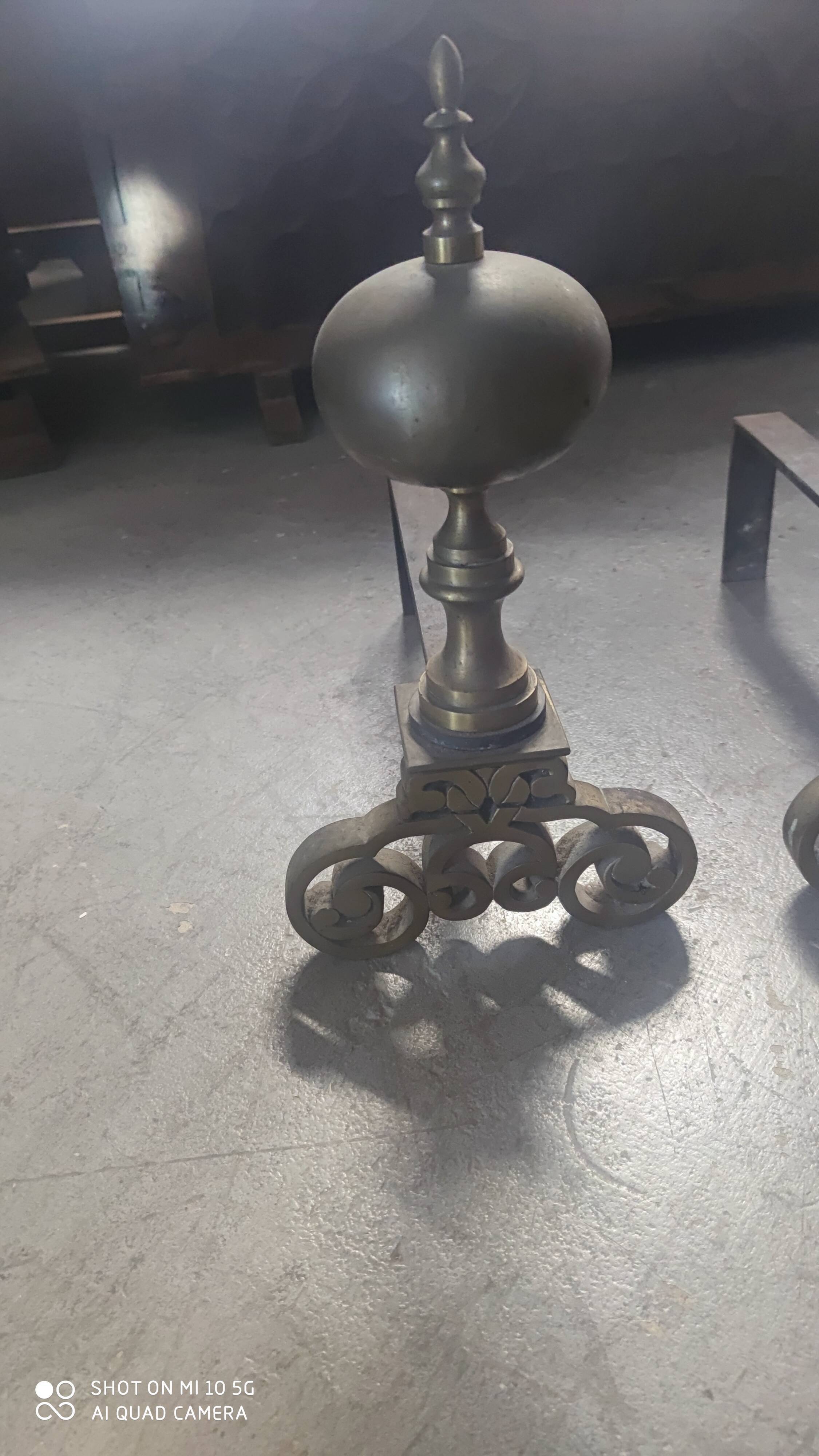 Pair of bronze and steel andirons, 19th century, Holland