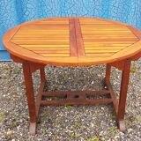 Stretchable garden dining table in solid teak