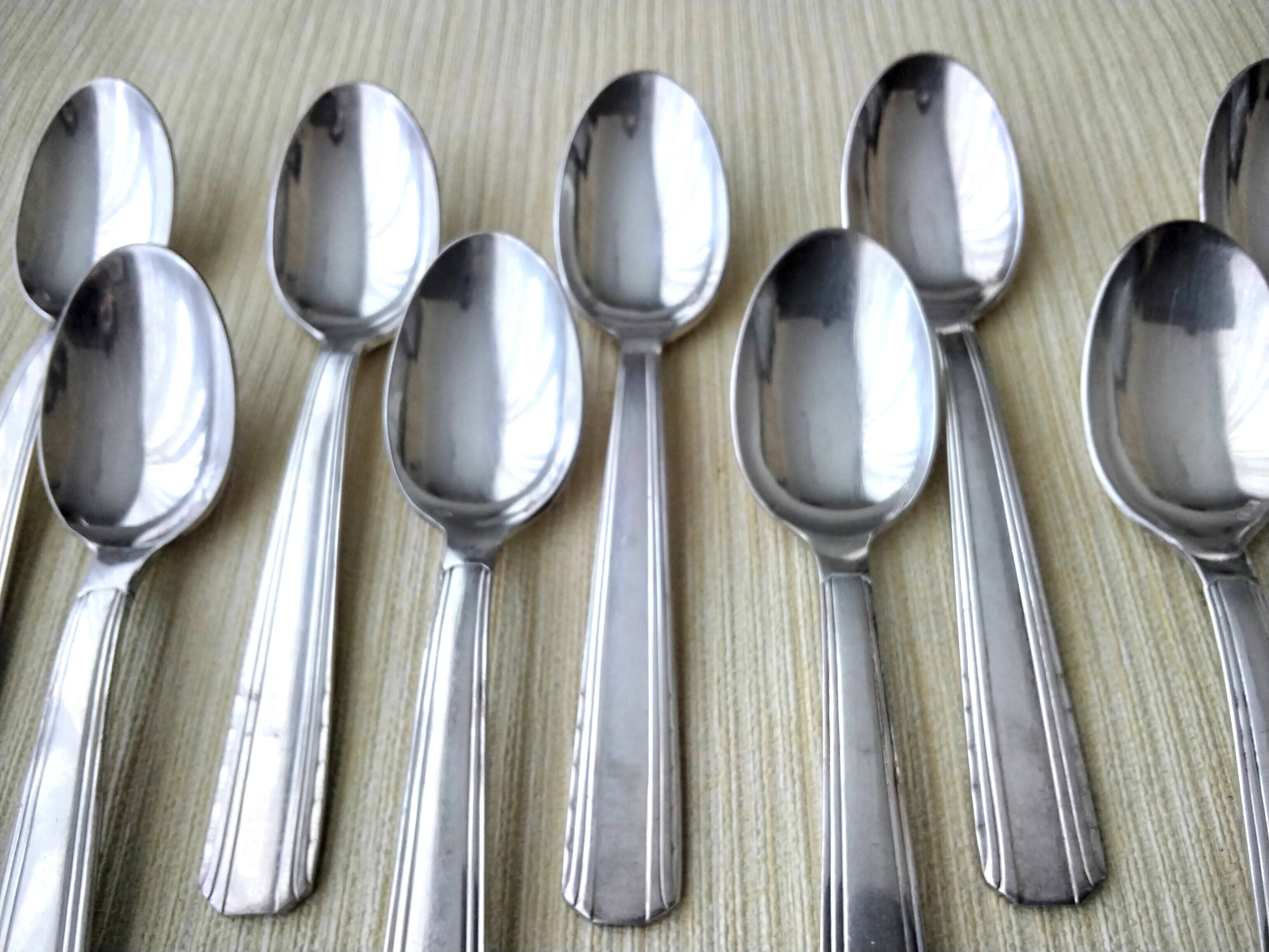 Set of 2 x 6 silver metal spoons 2 different models