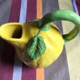 Lemon yellow ceramic pitcher