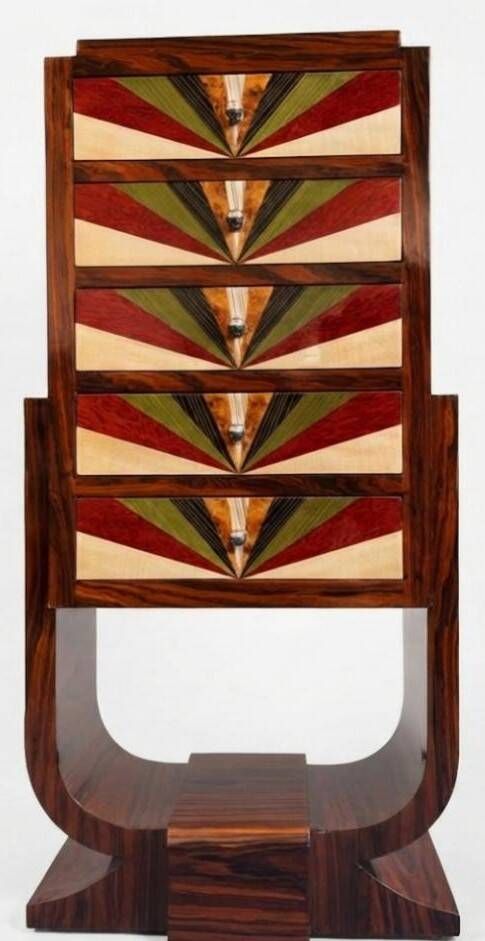 An Art Deco chest of drawers with five beech and rosewood drawers.
