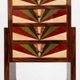 An Art Deco chest of drawers with five beech and rosewood drawers.