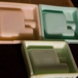 Three opalex ashtrays at the Logo of the Trans-Atlantic General Company - French Line - Model created by Jean Luce for the cruises of the liner Normandy and France