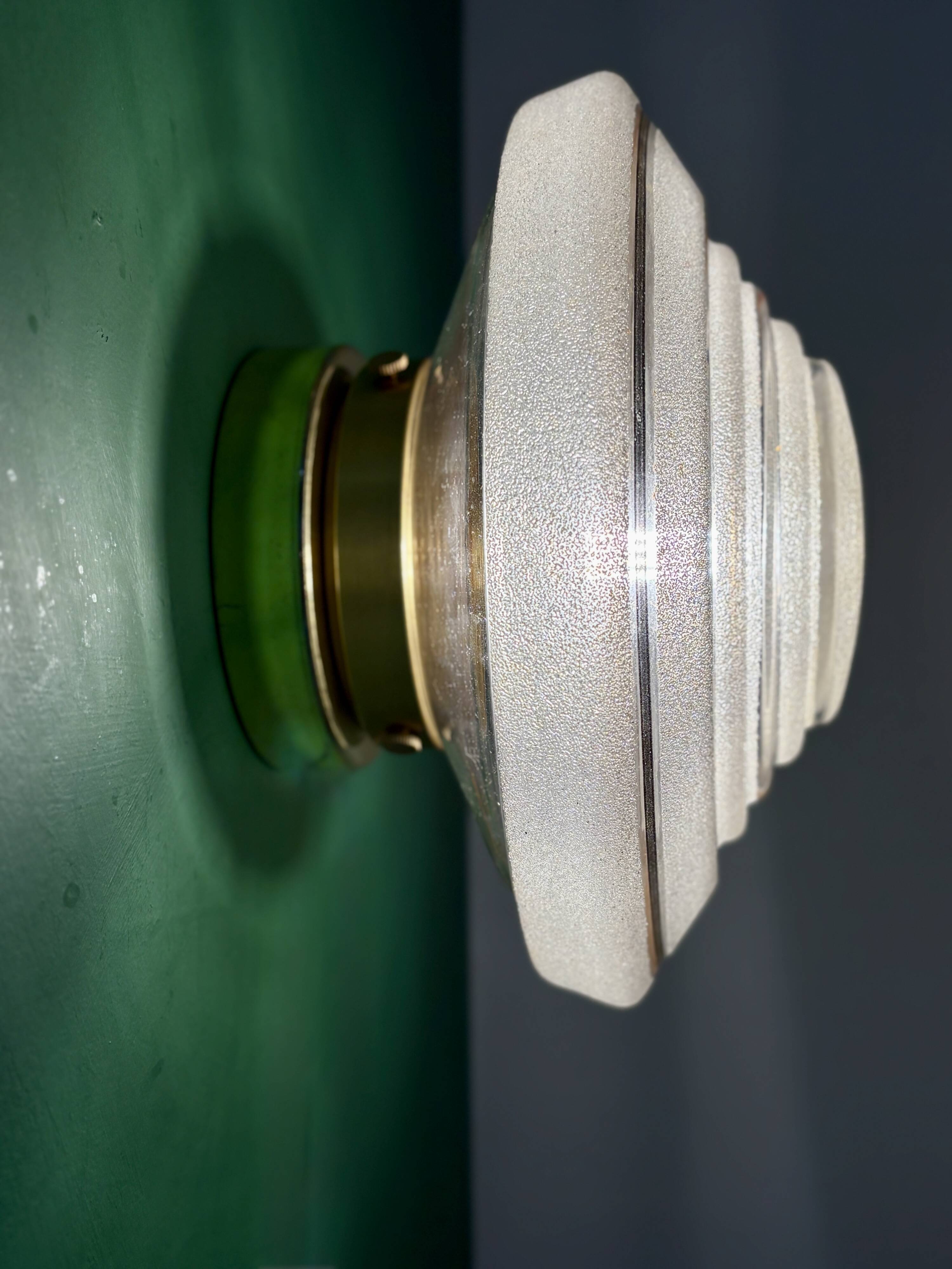 Old glass globe wall/ceiling light in frosted white and gold.