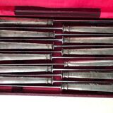 Set of 12 silver metal knives