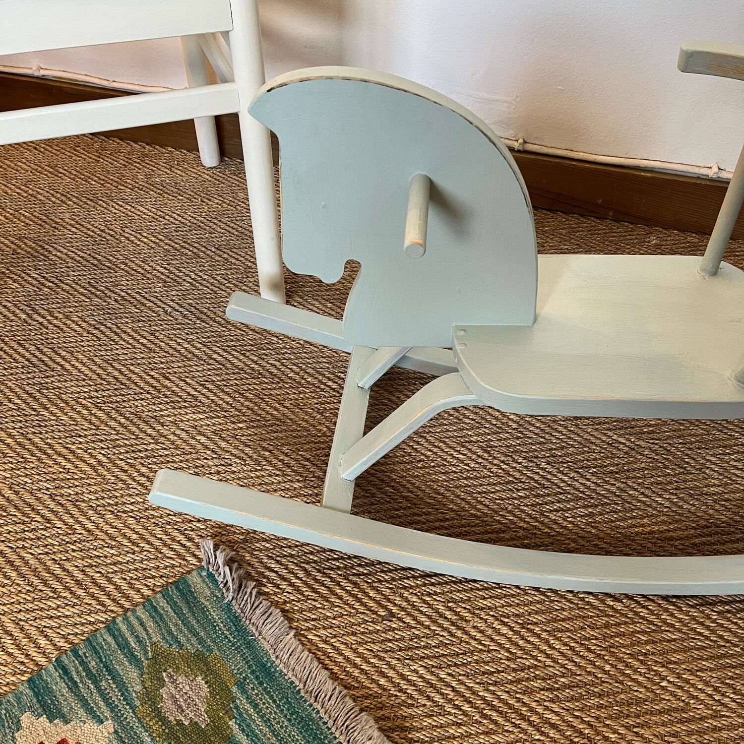 Vintage wooden rocking horse in its patina