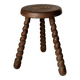 Wooden stool with three twisted legs