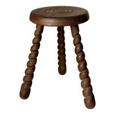 Tabouret en bois à trois pieds torsadés