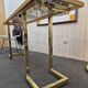 Vintage brass and smoked glass console.