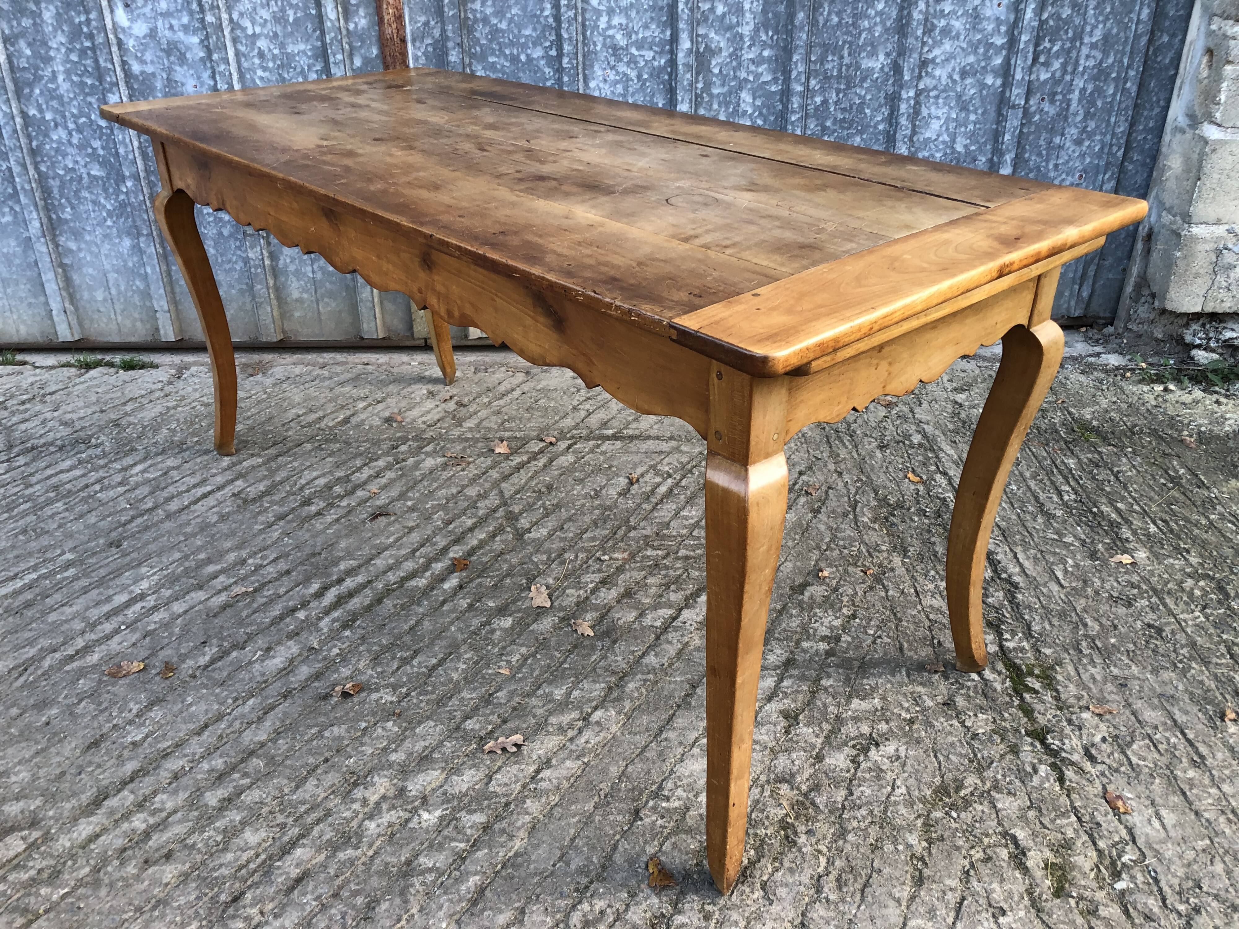 Antique Louis XV style farmhouse table in solid cherry wood.